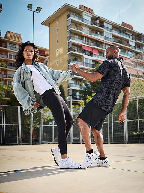 Woman and man wearing Rieker Sport Sneaker of the newest collection.