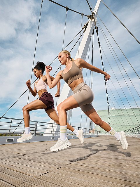 Two women are jogging in Rieker Sport running shoes.